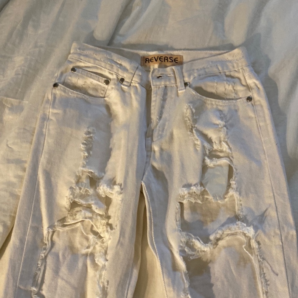 White ankle length destroyed jeans